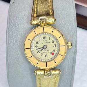 Vintage Virgin Islands De Luxe Orbit Quartz Working Watch - Gold Tone, Slim Band